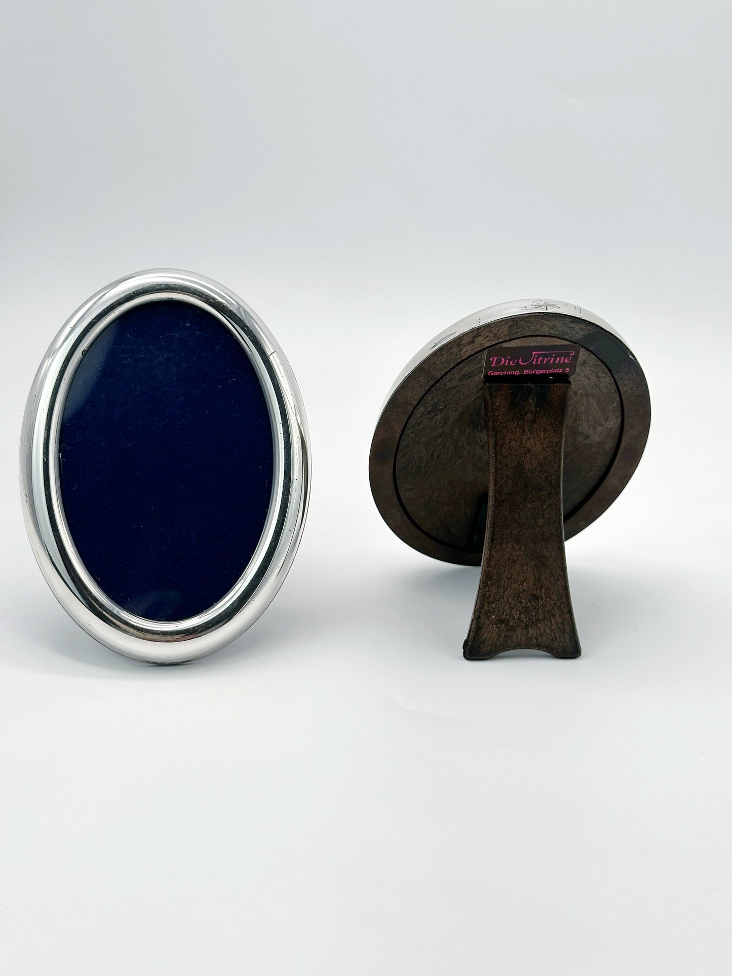 2 versilberte Bilderrahmen in ovaler Form